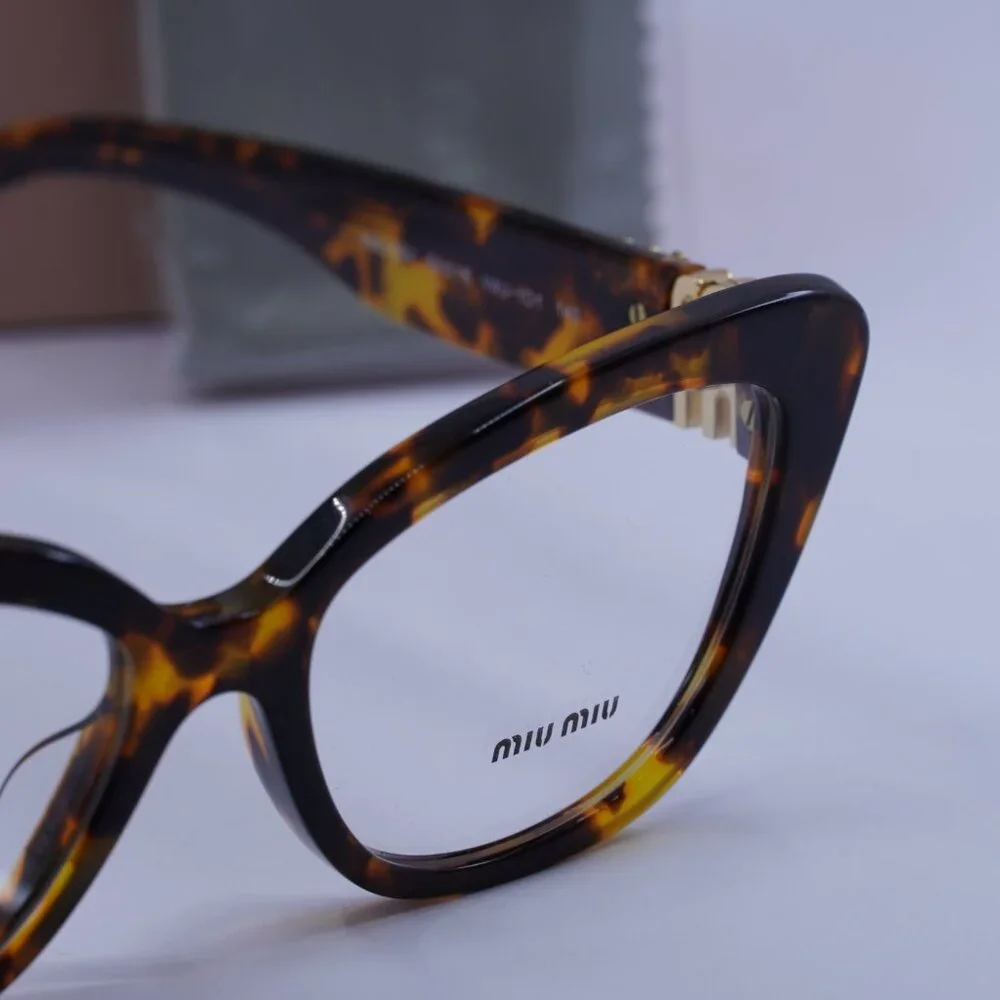 Miu Miu MU05VV VAU1O1 Cat Eye Eyeglasses 53mm – Honey Havana
